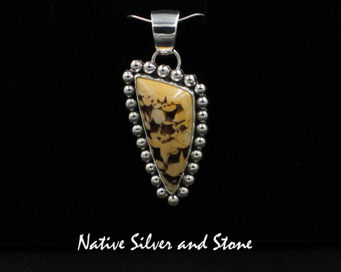 Artie Yellowhorse - Navajo<br>1-3/4" Pendant<br>Peanut Wood Triangle<br>Single Bead<br>Sterling Silver