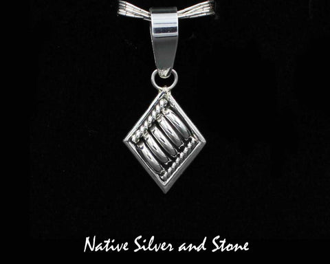 Thomas Charley/Charlie - Navajo<br>1-1/8" Pendant<br>Segmented "Melon"<br> Diamond-Shaped with Twist<br>Sterling Silver