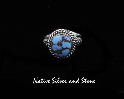 Artie Yellowhorse - Navajo<br>RGTTST<br>5/8" Ring<br>Golden Hills Turquoise<br>Oval-Rounded<br>Raised Stamped Shots on Flanks<br>Single Twist<br>Sterling Silver<br>Size: 7-1/2