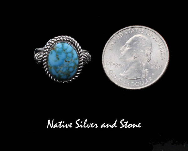 Z Artie Yellowhorse - Navajo<br>RGTTST<br>11/16" Ring<br>Kingman Turquoise<br>Oval<br>Raised Stamped Shots on Flanks<br>Single Twist<br>Sterling Silver<br>Sizes: 7-3/4