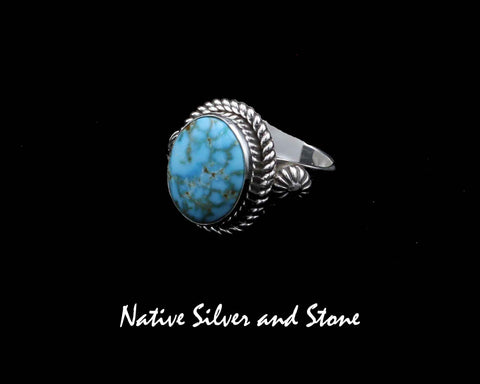 Z Artie Yellowhorse - Navajo<br>RGTTST<br>11/16" Ring<br>Kingman Turquoise<br>Oval<br>Raised Stamped Shots on Flanks<br>Single Twist<br>Sterling Silver<br>Sizes: 7-3/4