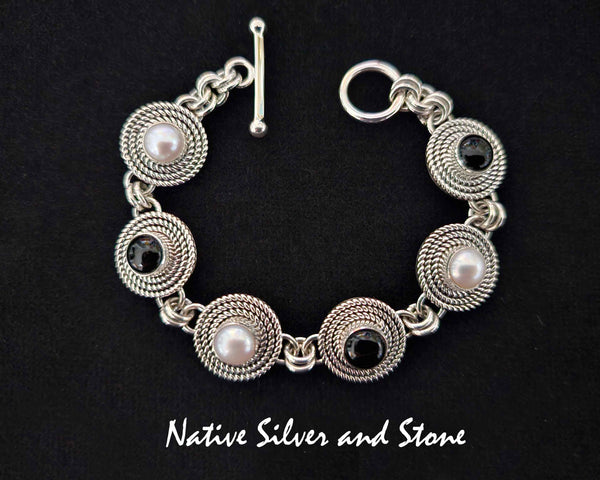 Artie Yellowhorse - Navajo<br>BRLKOX&P3T<br>1/2" Rounds Bracelet - Link<br>3 Twists - Alternating<br>8mm Onyx<br>8mm Pearl<br>Sterling Silver