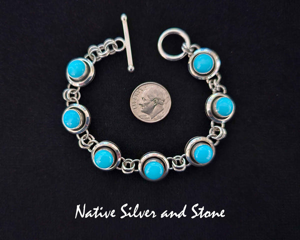 Artie Yellowhorse - Navajo<br>Bracelet - Link <br>1/2" Shadowbox Rounds with<br>8mm Sleeping Beauty Turquoise<br>Sterling Silver<br>Size (as worn)  6-1/8 to 6-3/4