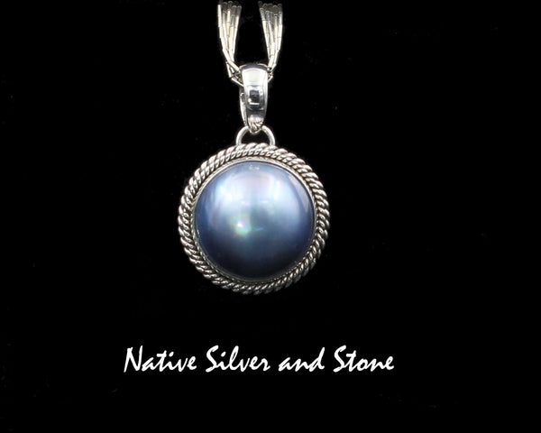 Artie Yellowhorse - Navajo<br>PDTPDT<br>7/8" Pendant<br>17mm Dark Grey-Blue<br>Mabe Pearl<br>Double Twist<br>Sterling Silver