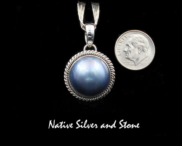 Artie Yellowhorse - Navajo<br>PDTPDT<br>7/8" Pendant<br>17mm Dark Grey-Blue<br>Mabe Pearl<br>Double Twist<br>Sterling Silver