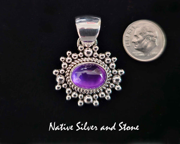 Artie Yellowhorse - Navajo<br>PDTA1TBB<br>15/16"  Pendant<br>Amethyst<br>Small Horizontal Oval<br>Single Twist - Burst Beads/Scatterdot<br>Sterling Silver