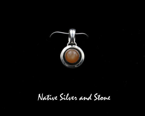 Artie Yellowhorse - Navajo<br>5/8" Pendant<br>8mm Apricot Moonstone<br>Small Domed Shadowbox<br>Sterling Silver