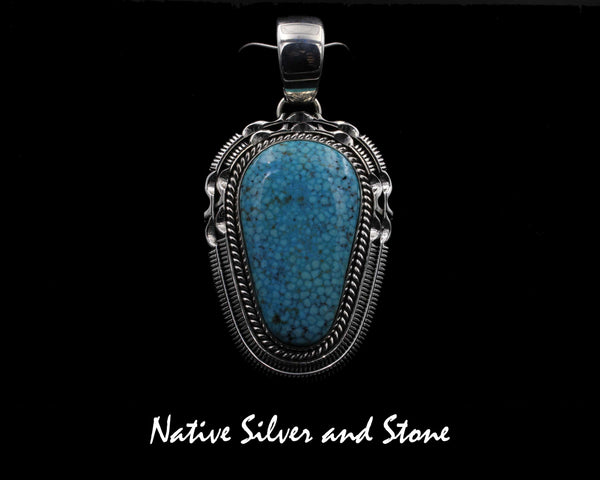 Artie Yellowhorse - Navajo<br>PDTTDSC<br>2" Pendant<br>Kingman Turquoise<br>Soft Triangle Freeform<br>Single Twistwire &<br>Double Saw-cut with Pinches<br>Sterling Silver