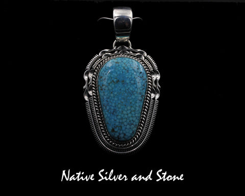 Artie Yellowhorse - Navajo<br>PDTTDSC<br>2" Pendant<br>Kingman Turquoise<br>Soft Triangle Freeform<br>Single Twistwire &<br>Double Saw-cut with Pinches<br>Sterling Silver