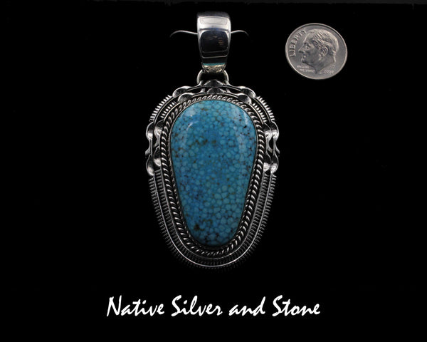 Artie Yellowhorse - Navajo<br>PDTTDSC<br>2" Pendant<br>Kingman Turquoise<br>Soft Triangle Freeform<br>Single Twistwire &<br>Double Saw-cut with Pinches<br>Sterling Silver