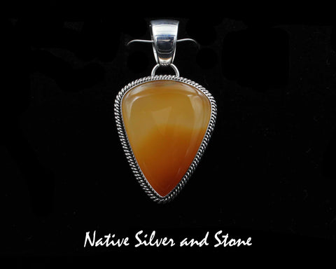 Artie Yellowhorse - Navajo<br>PDTM1DT<br>1-9/16"  Pendant<br>Orange-Amber Agate<br>Large Soft Triangle<br>Double Twist<br>Sterling Silver