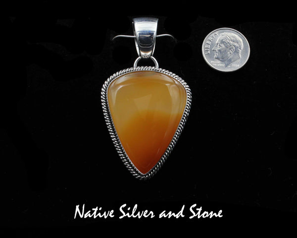 Artie Yellowhorse - Navajo<br>PDTM1DT<br>1-9/16"  Pendant<br>Orange-Amber Agate<br>Large Soft Triangle<br>Double Twist<br>Sterling Silver