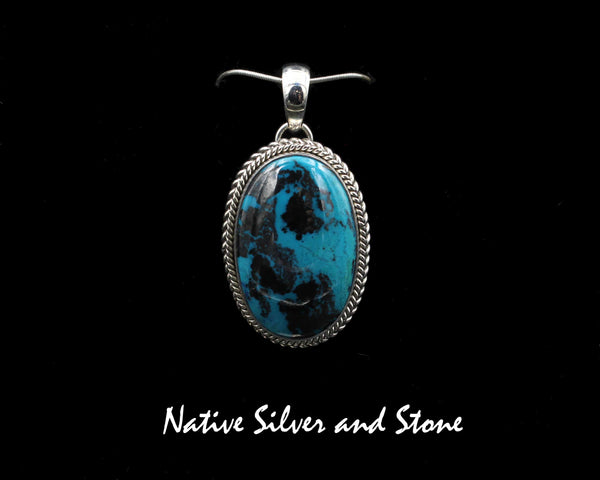Artie Yellowhorse - Navajo<br>PDSKDT<br>1-1/4"  Pendant<br>Shattuckite<br>Medium Oval<br>Double Twist<br>Sterling Silver