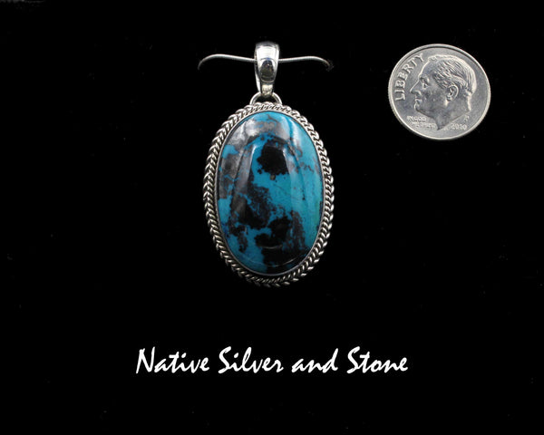Artie Yellowhorse - Navajo<br>PDSKDT<br>1-1/4"  Pendant<br>Shattuckite<br>Medium Oval<br>Double Twist<br>Sterling Silver