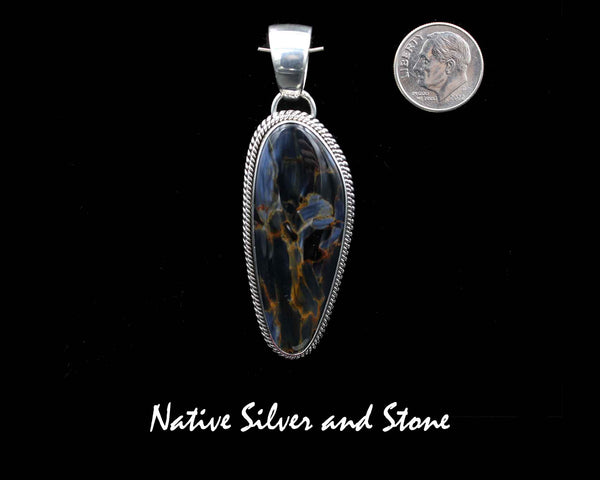 Z Artie Yellowhorse - Navajo<br>2" Pendant<br>Pietersite/Pietercite - Blue/Gold<br> Medium Vertical Freeform<br>Double Twist<br>Sterling Silver