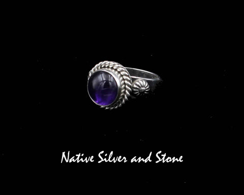 Artie Yellowhorse - Navajo<br>9/16" Ring<br>9+mm Amethyst Round<br>Single Twist<br>Shots on Flanks<br>Sterling Silver<br>Sizes: 6 & 8