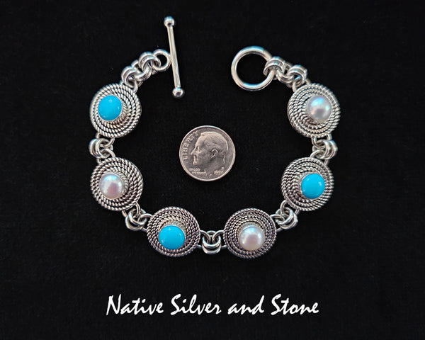 Artie Yellowhorse - Navajo<br>BRLKTSB&P3T<br>1/2" Rounds Bracelet - Link<br>3 Twists - Alternating<br>8mm Sleeping Beauty Turquoise<br>8mm Pearl<br>Sterling Silver