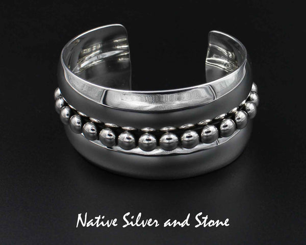Artie Yellowhorse - Navajo<br>BCAS<br>1-5/16" Bracelet Cuff<br>Center Line of 1/4" Large Beads/Dots<br>Rounded Flanks<br>Sterling Silver<br>Size 6-5/16 (Medium)