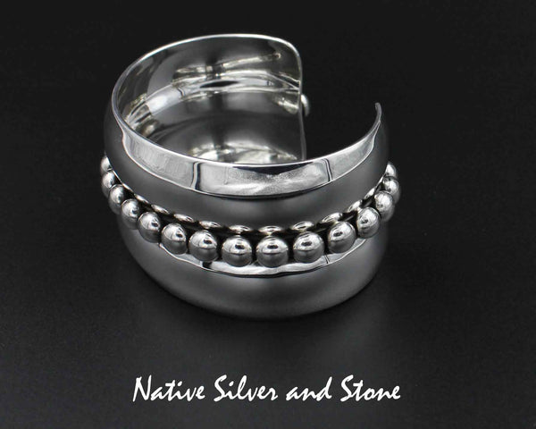 Artie Yellowhorse - Navajo<br>BCAS<br>1-5/16" Bracelet Cuff<br>Center Line of 1/4" Large Beads/Dots<br>Rounded Flanks<br>Sterling Silver<br>Size 6-5/16 (Medium)