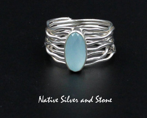 Z Angela Martin - Navajo<br>1/2" Ring<br>Faceted Chalcedony Oval<br>Branch Wire Design<br>Sterling Silver<br>Size 8