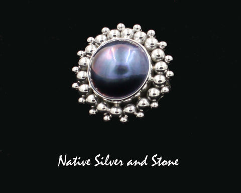 Artie Yellowhorse - Navajo<br>1-1/8" Ring<br>17mm Dark Grey-Blue<br>Mabe Pearl<br>Burst Bead<br>Sterling Silver<br>Size 8