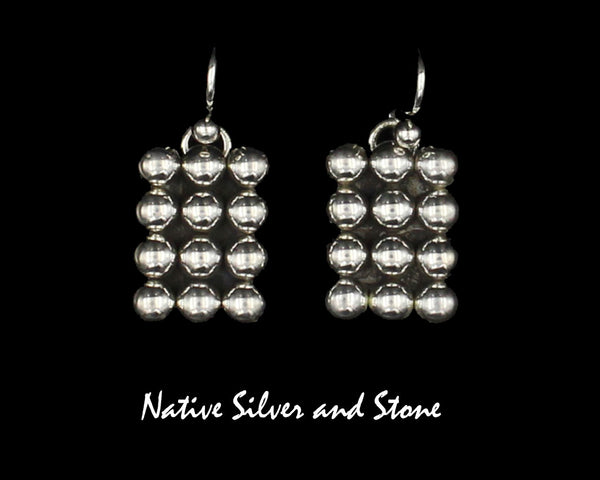 Z Artie Yellowhorse - Navajo<br>11/16" Earrings<br>Vertical Rectangle<br>12 Medium-Small Beads<br>Hook<br>Sterling Silver