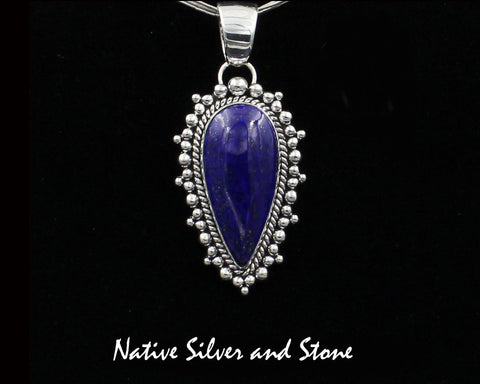 Z Artie Yellowhorse - Navajo<br>PDLTBB<br>1-7/8" Pendant <br>35mm x 16mm Lapis Lazuli<br>Reverse Teardrop/Pear<br>Single Twistwire & Burst Beads<br>Sterling Silver
