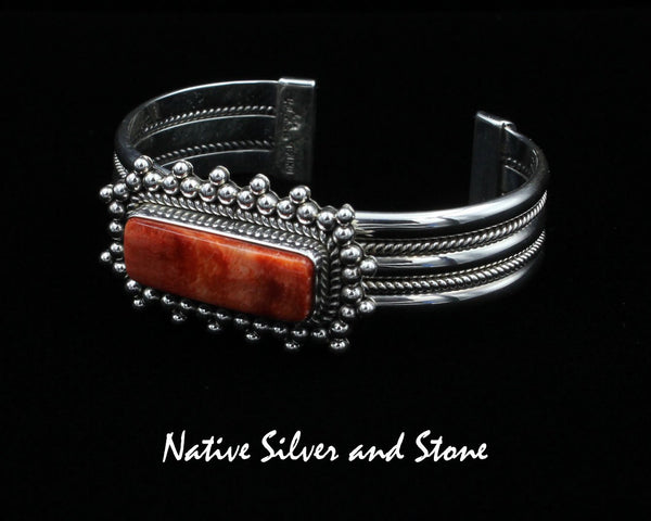Z Artie Yellowhorse - Navajo<br>BCOSTBB<br>5/8" Bracelet Cuff<br>10mm Orange Spiny Rectangle<br>Single Twist w Burst Bead/Scatterdot<br>Twist & Rail Band<br>Size 6-1/2" (Medium)