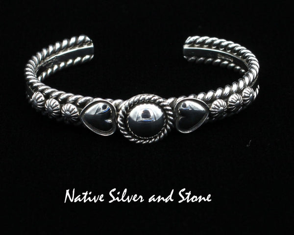 Artie Yellowhorse - Navajo<br>BCASHTST<br>3/8" Bracelet Cuff<br>9/16" Dome w Twist<br>Dual Hearts, & Shots<br>Sterling Silver<br>Size 6-1/8 (Medium)