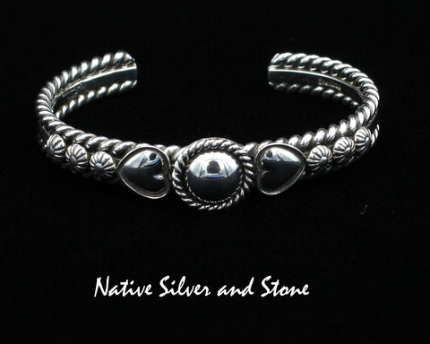 Artie Yellowhorse - Navajo<br>BCASHTST<br>3/8" Bracelet Cuff<br>9/16" Dome w Twist<br>Dual Hearts, & Shots<br>Sterling Silver<br>Size 6-1/8 (Medium)