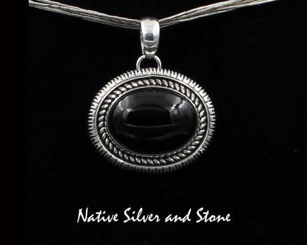 Artie Yellowhorse - Navajo<br>PDTSSC<br>7/8"H Pendant<br>15mm x 20mm Onyx Horizontal Oval<br>Twist & Single Straight Sawcut<br>Sterling Silver