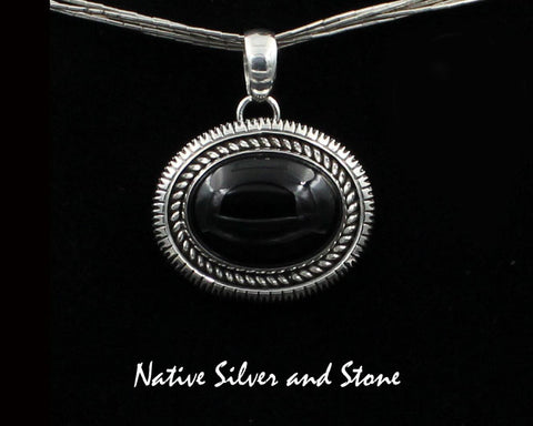 Artie Yellowhorse - Navajo<br>PDTSSC<br>7/8"H Pendant<br>15mm x 20mm Onyx Horizontal Oval<br>Twist & Single Straight Sawcut<br>Sterling Silver