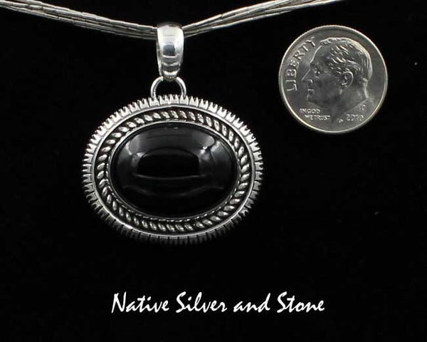 Artie Yellowhorse - Navajo<br>PDTSSC<br>7/8"H Pendant<br>15mm x 20mm Onyx Horizontal Oval<br>Twist & Single Straight Sawcut<br>Sterling Silver