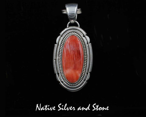 Z Artie Yellowhorse - Navajo<br>1-3/4" Pendant<br>32mm x 13mm Orange Spiny<br>Long Oval<br>Single Twist &<br>Double Sawcut with Pinches<br>Sterling Silver