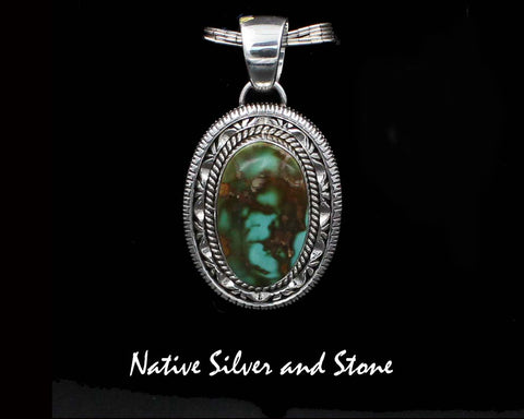 Z Artie Yellowhorse - Navajo<br>PDTTDSC<br>1-5/8" Pendant Vertical Oval<br>28mm Royston Natural Turquoise<br>Twist & Double Sawcut Pinch and Straight<br>Sterling Silver