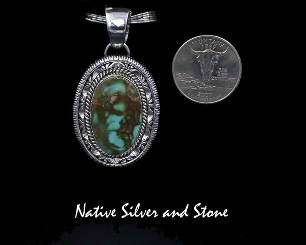 Z Artie Yellowhorse - Navajo<br>PDTTDSC<br>1-5/8" Pendant Vertical Oval<br>28mm Royston Natural Turquoise<br>Twist & Double Sawcut Pinch and Straight<br>Sterling Silver