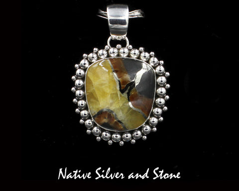 Z Artie Yellowhorse - Navajo<br>1-5/8"H Pendant<br>30mm x 28mm Simbercite<br>Vertical Rectangle<br>Large & Small Offset Beads<br>Sterling Silver