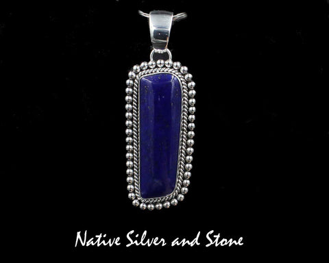 Z Artie Yellowhorse<br>Navajo<br>2-1/2" Pendant <br>50mm x 17mm Lapis Lazuli<br>Freeform Rectangle<br>Single Twist & Bead<br>Sterling Silver