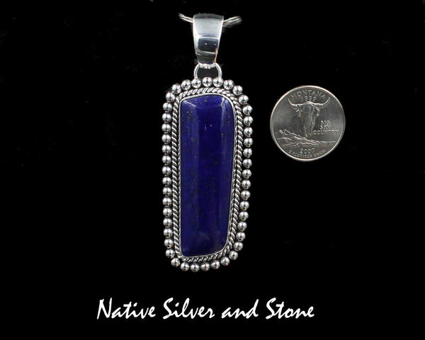 Z Artie Yellowhorse<br>Navajo<br>2-1/2" Pendant <br>50mm x 17mm Lapis Lazuli<br>Freeform Rectangle<br>Single Twist & Bead<br>Sterling Silver
