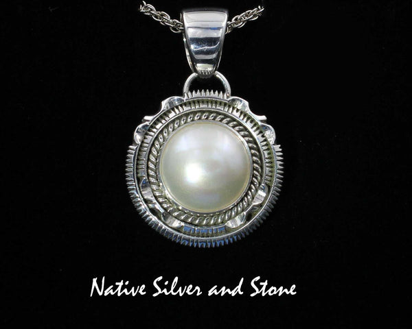 Z Artie Yellowhorse - Navajo<br>PDPTDSCP<br>1-1/8"  Pendant<br>16mm White Mabe Pearl<br>Single Twist & Double Sawcut w Pinches<br>Sterling Silver