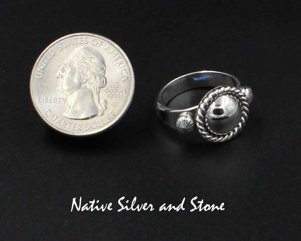 Artie Yellowhorse - Navajo<br>9/16" Ring<br>10mm Small Dome<br>Raised Stamped Shots on Flanks<br>Single Twist<br>Sterling Silver<br>Sizes: 6-1/2, 7-1/4, 7-1/2