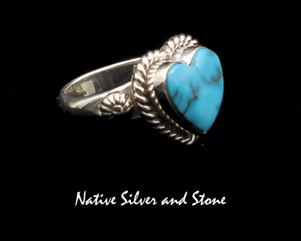 Artie Yellowhorse - Navajo<br>RGTTSHT<br>5/8" Ring<br>11mm Kingman Turquoise<br>Heart<br>Single Twist<br>Punched Shots<br>Sterling Silver<br>Size 7
