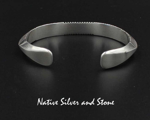 Z Artie Yellowhorse - Navajo<br>D1<br>by Henry Chackee<br>Navajo<br>3/8" Bracelet Cuff<br>Tri-Peaked Sawcuts<br>Flared Ends<br>Sterling Silver<br>Size 6-3/8 (Medium)