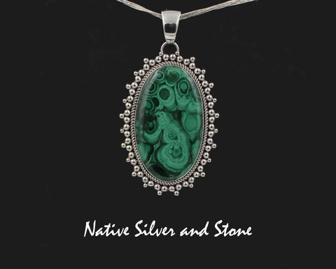Z Artie Yellowhorse* - Navajo<br>2-3/4"  Pendant<br>Malachite<br>X-Large Vertical Oval<br>Single Twist - Burst Beads<br>Sterling Silver