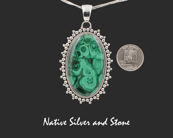 Z Artie Yellowhorse* - Navajo<br>2-3/4"  Pendant<br>Malachite<br>X-Large Vertical Oval<br>Single Twist - Burst Beads<br>Sterling Silver