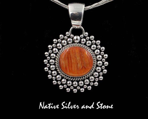 Z Artie Yellowhorse - Navajo<br>1-3/8"H Pendant<br>28mm x 20mm Orange Spiny<br>Small-Medium Horizontal Oval<br>Single Twist & Multi-Row Beads<br>Sterling Silver