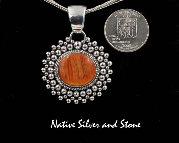 Z Artie Yellowhorse - Navajo<br>1-3/8"H Pendant<br>28mm x 20mm Orange Spiny<br>Small-Medium Horizontal Oval<br>Single Twist & Multi-Row Beads<br>Sterling Silver
