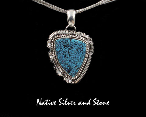 Artie Yellowhorse - Navajo<br>PDTTSC<br>1-1/8" Pendant<br>Kingman Turquoise<br>Petite Triangle/Shield<br>Single Twistwire & Sawcut with Pinch<br>Sterling Silver