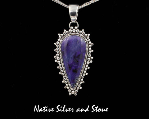 Z Artie Yellowhorse - Navajo<br>2-1/4"  Pendant<br>Sugilite<br>Medium-Large Reverse Teardrop<br>Single Twist - Burst Beads<br>Sterling Silver