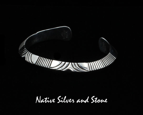 Z Artie Yellowhorse - Navajo<br>D1<br>by Henry Chackee<br>Navajo<br>3/8" Bracelet Cuff<br>Tri-Peaked Sawcuts<br>Flared Ends<br>Sterling Silver<br>Size 6-3/8 (Medium)
